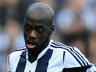 West Brom's Mulumbu stretc...